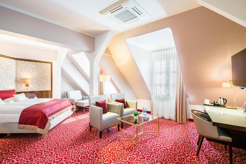 Postel nebo postele na pokoji v ubytování Best Western Plus Hotel StadtPalais