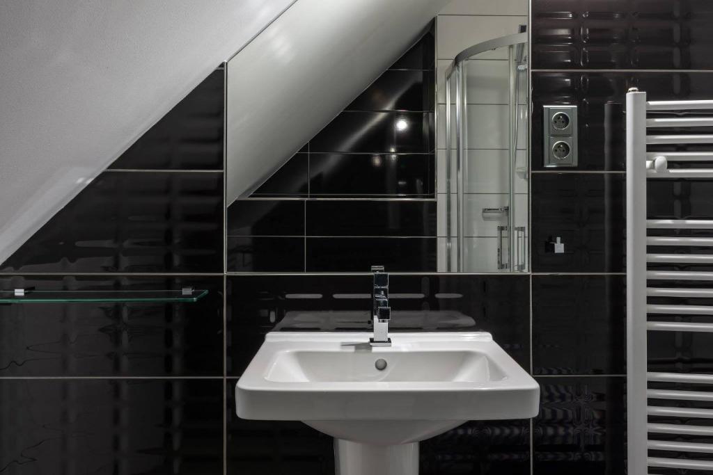 Koupelna v ubytování Hotel Grand