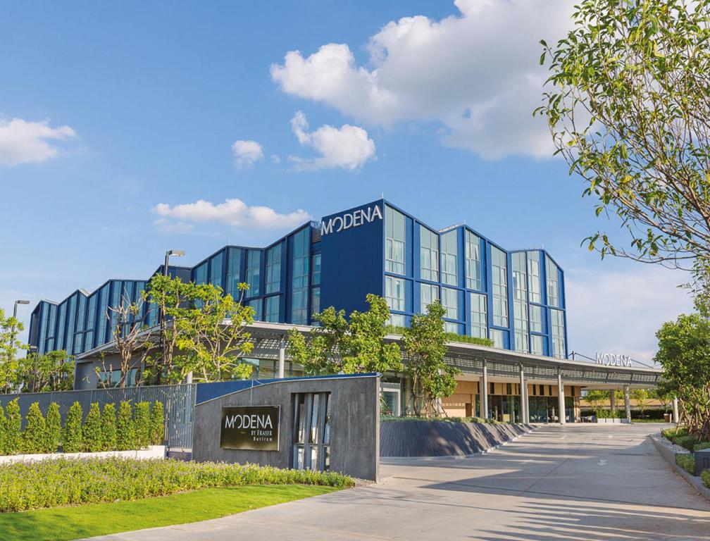 a view of the mgm hotel from the street at Modena by Fraser Buriram in Buriram