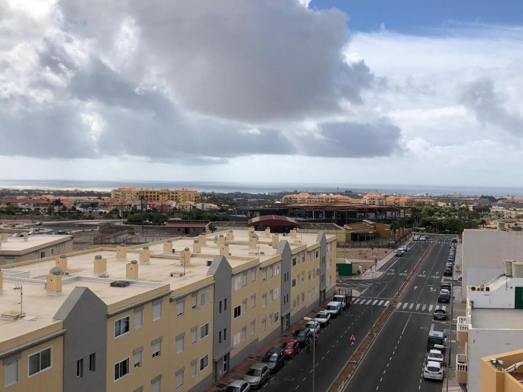 an aerial view of a city with buildings and a street at Bonito Apartamento 8 pax, TABLERO 9, cerca Playa Ingles in El Tablero