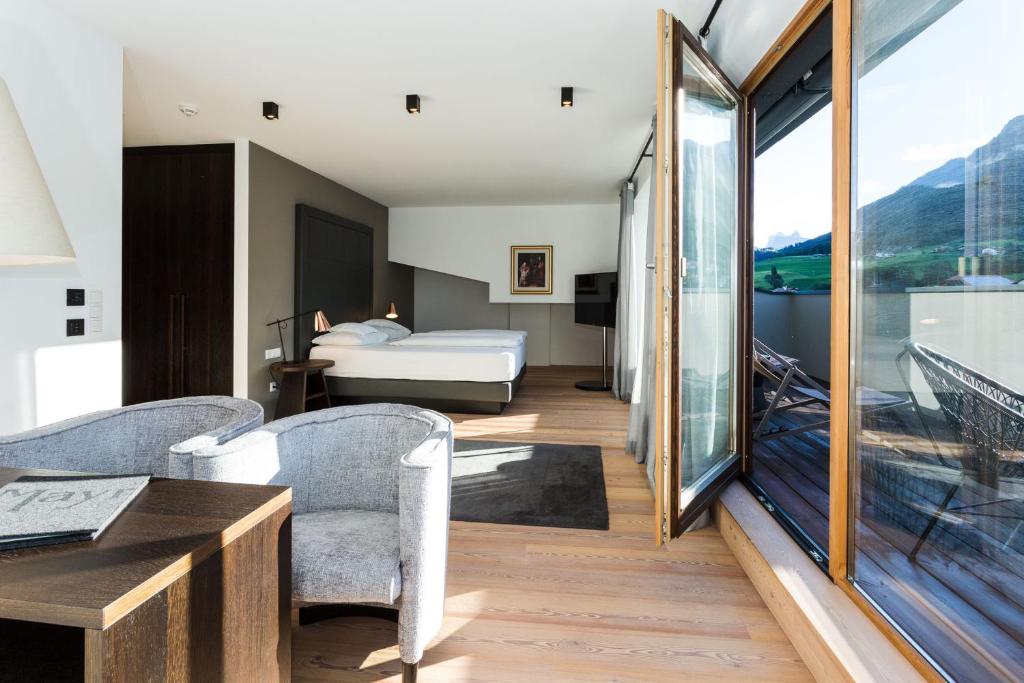 Postel nebo postele na pokoji v ubytování Hotel MAYR