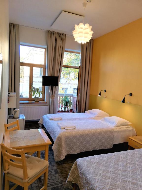 Postel nebo postele na pokoji v ubytování Moja Accommodation