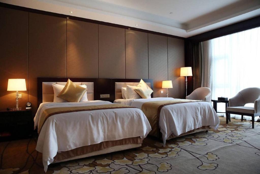Jinling New Town Hotel Nanjing - Luxe Tweelingzaal