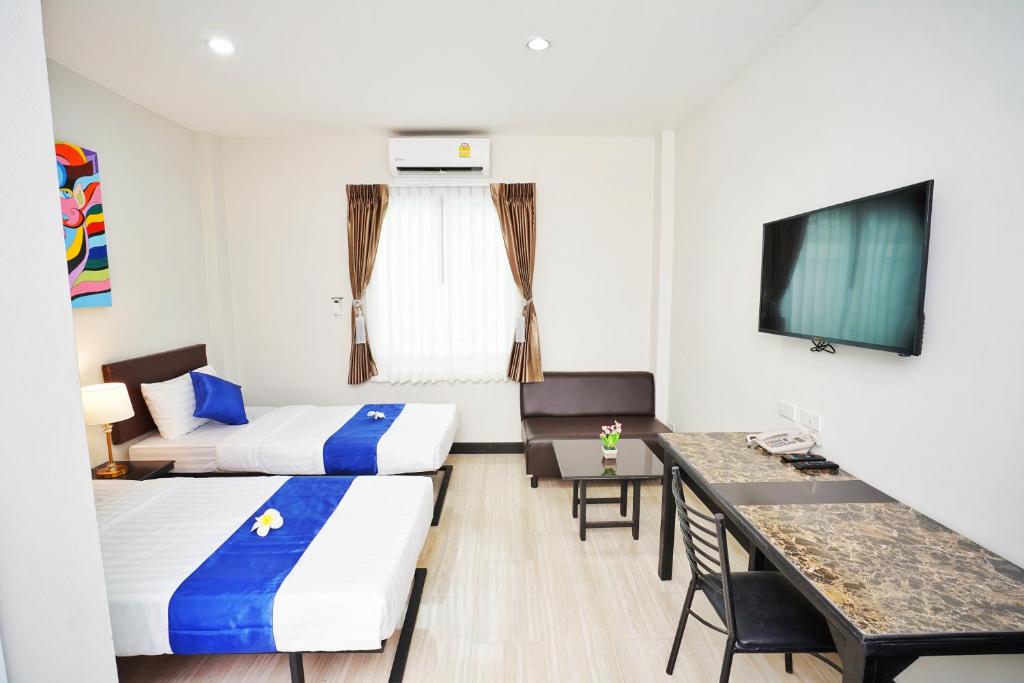 TV a/nebo společenská místnost v ubytování Sabai Place Donmueang Airport