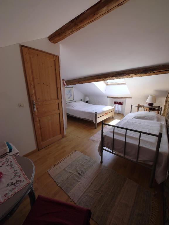 Letto o letti in una camera di Gite Cal Pai