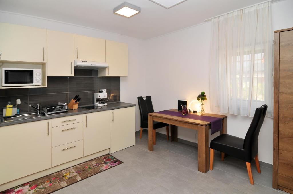 Kuchyňa alebo kuchynka v ubytovaní Silver Beach Apartments