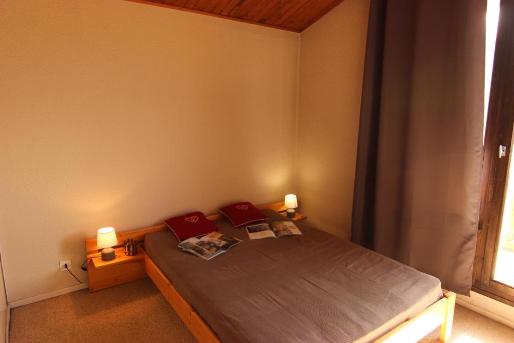 Postel nebo postele na pokoji v ubytování Roche Blanche Appartements VTI