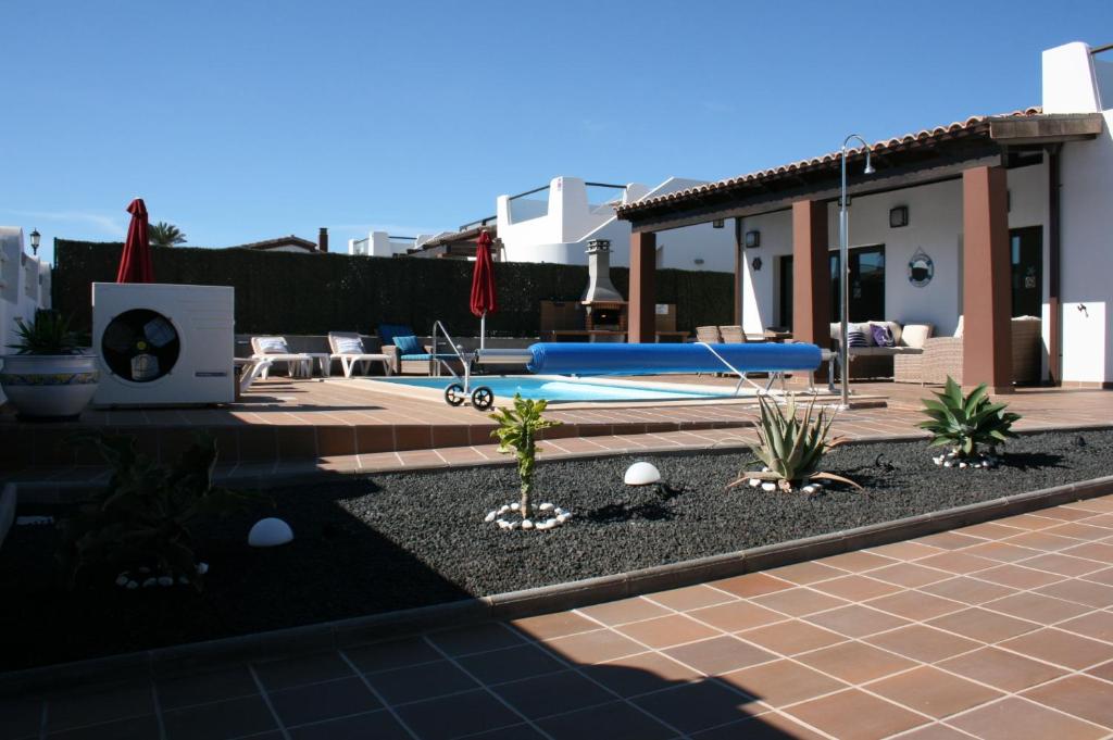 Bazén v ubytování VILLA DREAMS - VILLAS LA ESTANCIA - nebo v jeho okolí