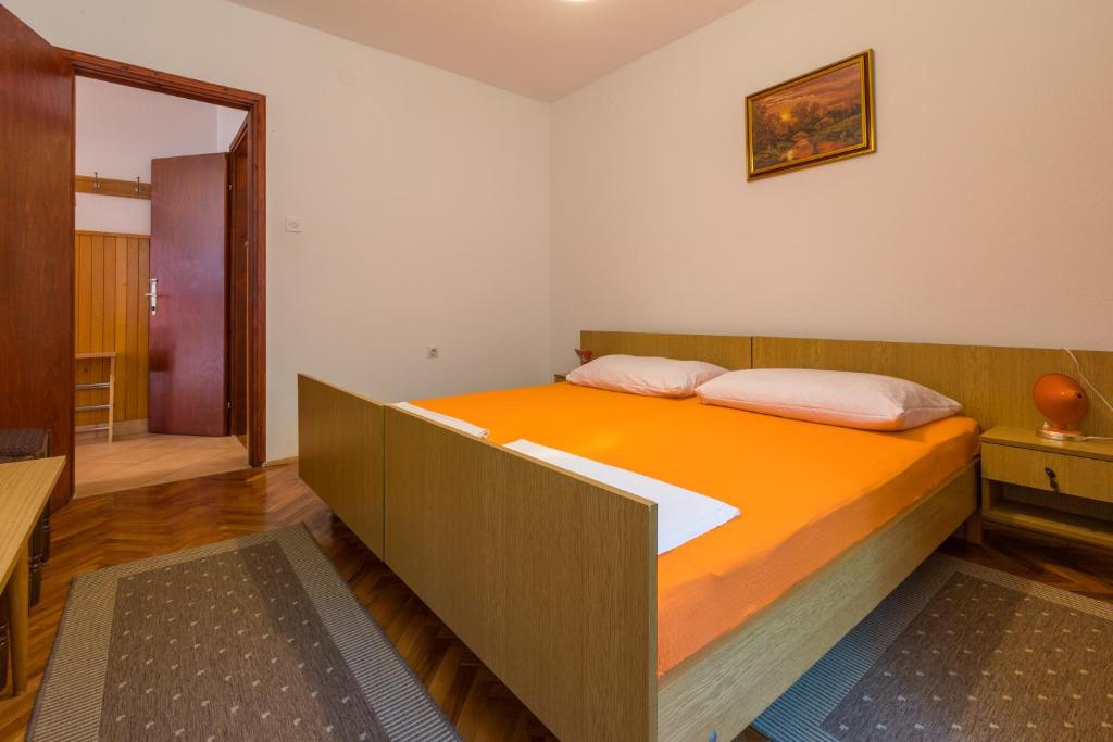 Postel nebo postele na pokoji v ubytování APARTMAN VERA