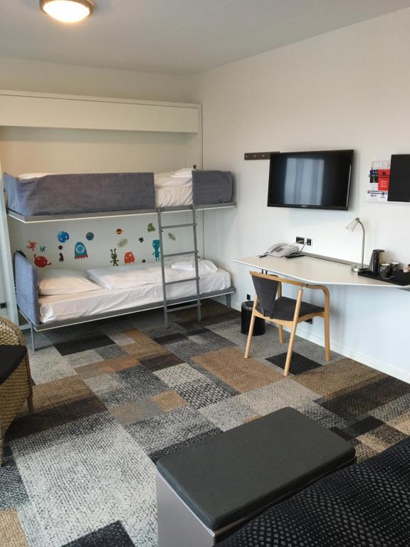 Voodi või voodid majutusasutuse Hotel Skivehus toas