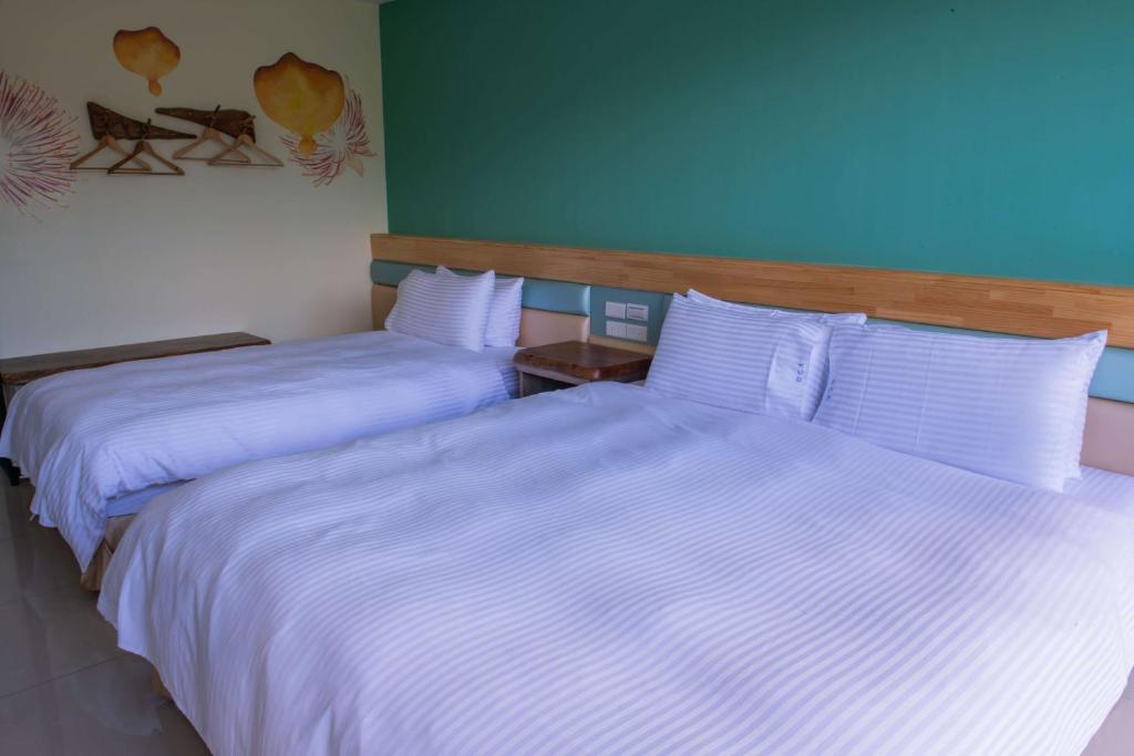 Letto o letti in una camera di Toptai Homestay