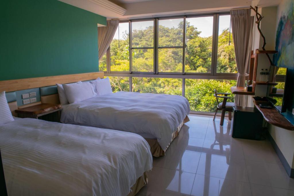 Letto o letti in una camera di Toptai Homestay