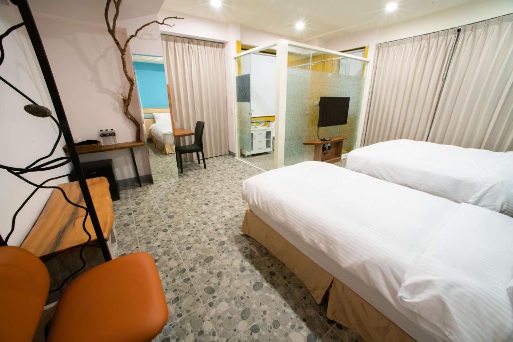 Letto o letti in una camera di Toptai Homestay