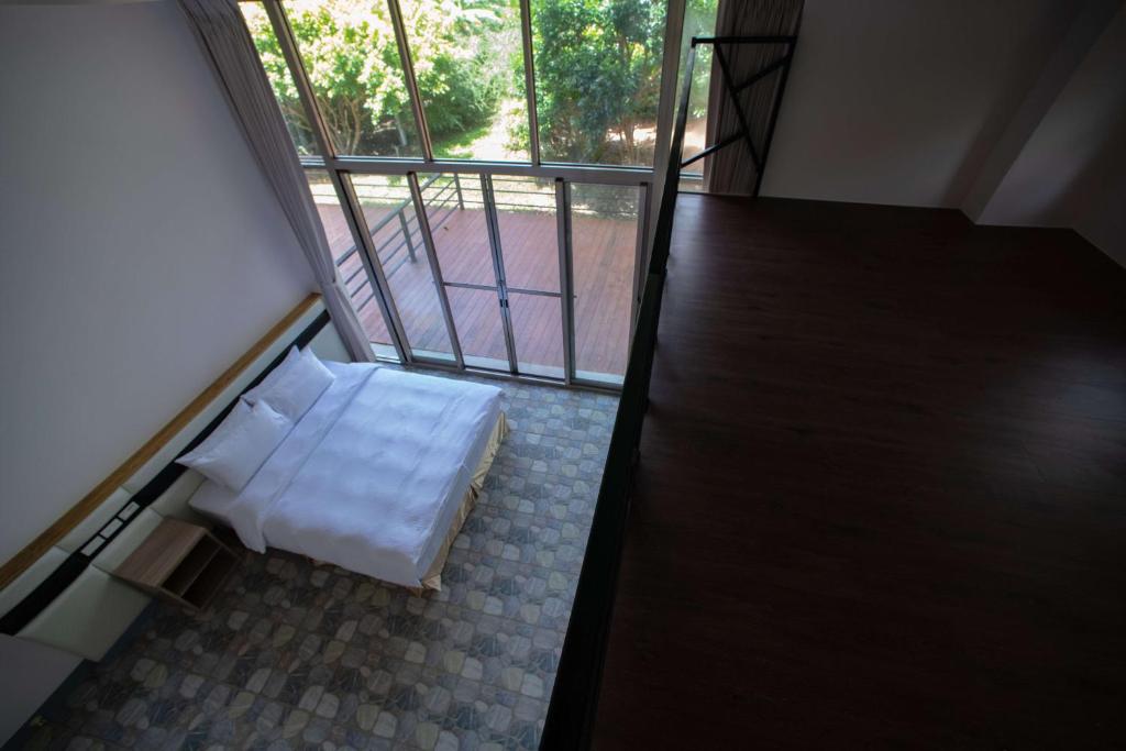 Letto o letti in una camera di Toptai Homestay
