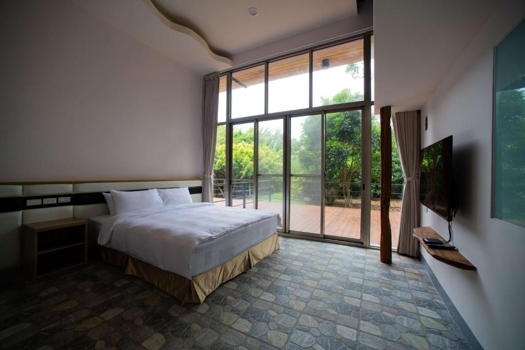Letto o letti in una camera di Toptai Homestay