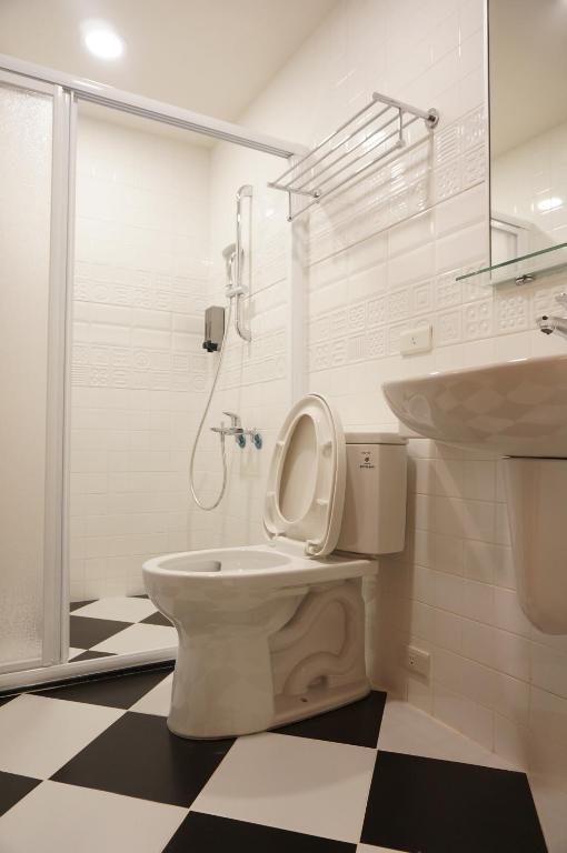 Koupelna v ubytování Ji Apartment