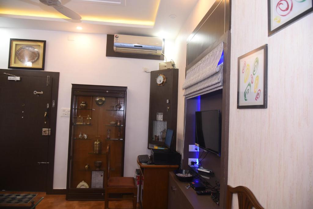 TV a/nebo společenská místnost v ubytování Square Suite