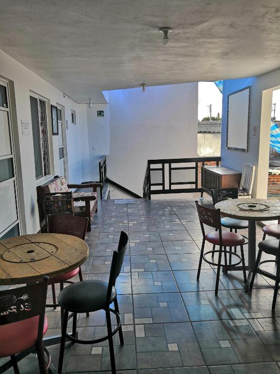 Posezení v ubytování Hostal Maple