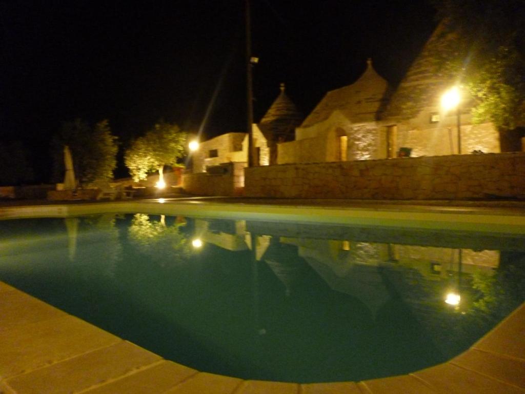 Bazén v ubytování Trulli & Grotte Exclusive House nebo v jeho okolí