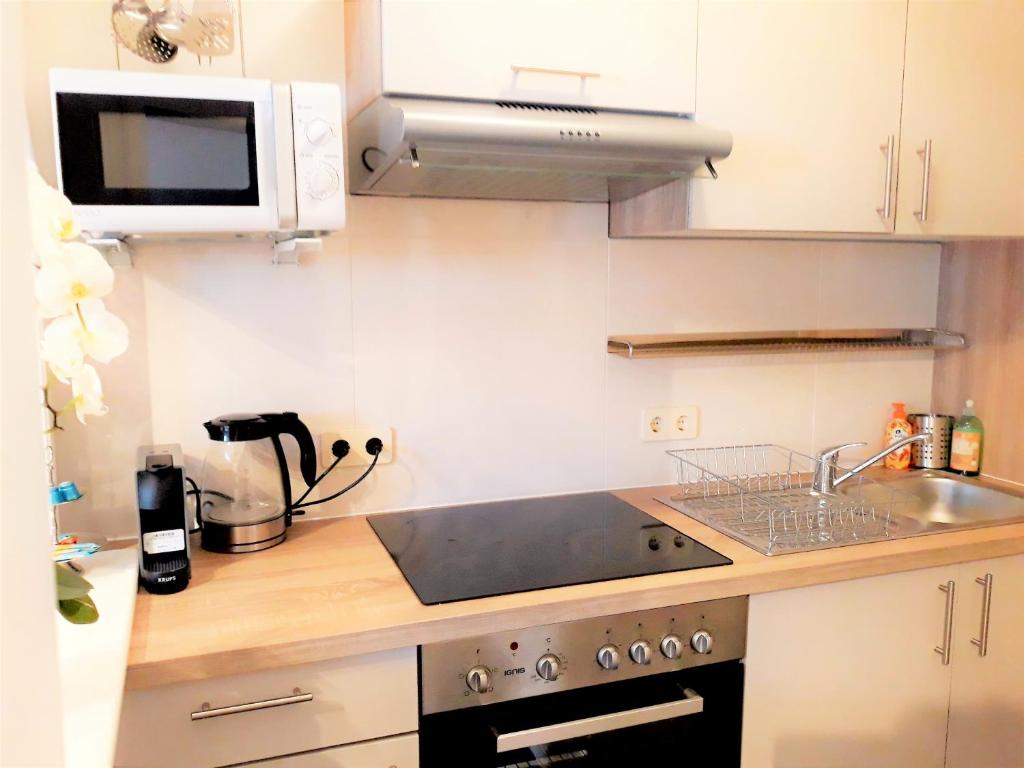 Kuchyňa alebo kuchynka v ubytovaní APARTMENTS zum Wohlfühlen MARIAZELL