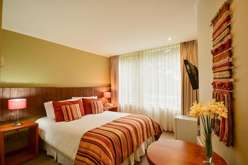 Postel nebo postele na pokoji v ubytování Hotel Terraza Suite