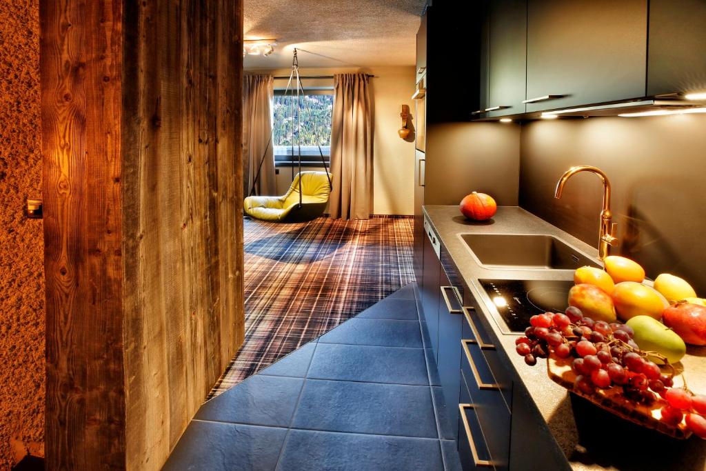 Kuchyňa alebo kuchynka v ubytovaní HEART - Manufaktur Appartements