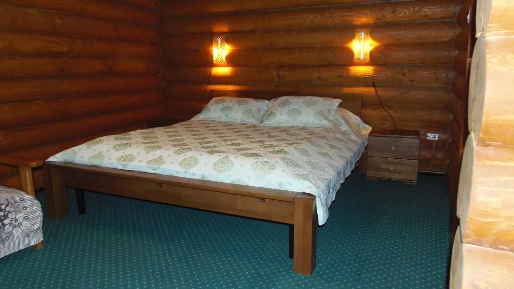 Postel nebo postele na pokoji v ubytování Tourist complex Karina