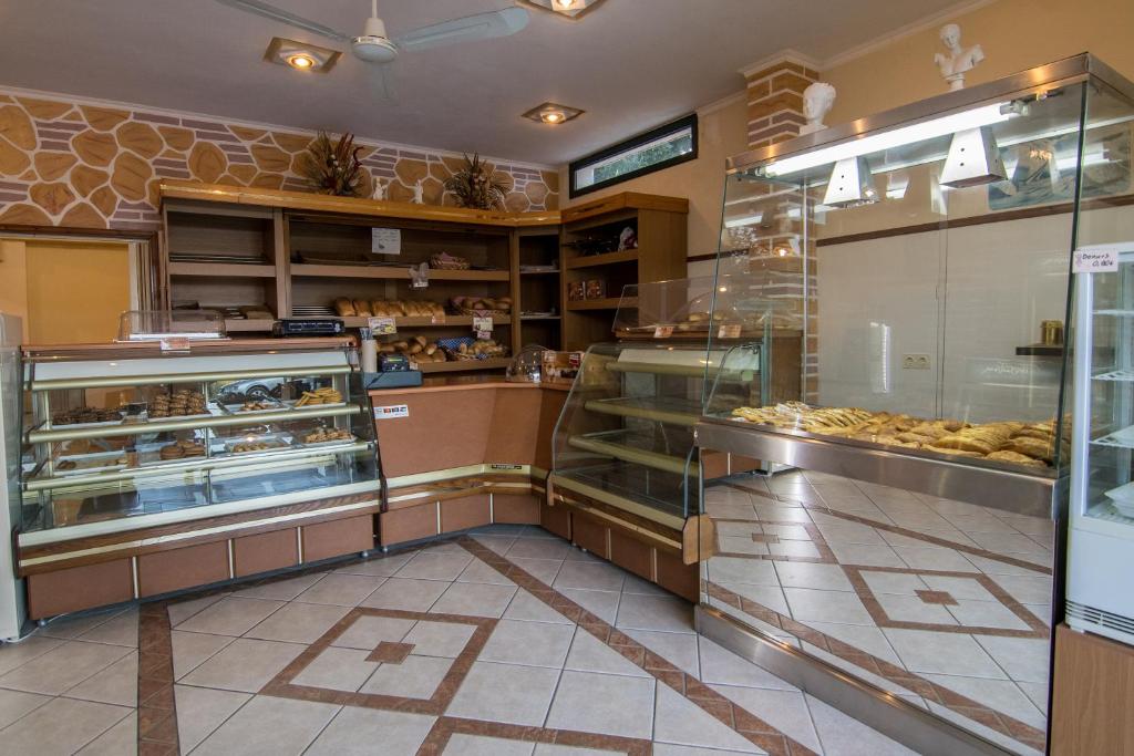 Kuchyň nebo kuchyňský kout v ubytování Hotel Agios Thomas