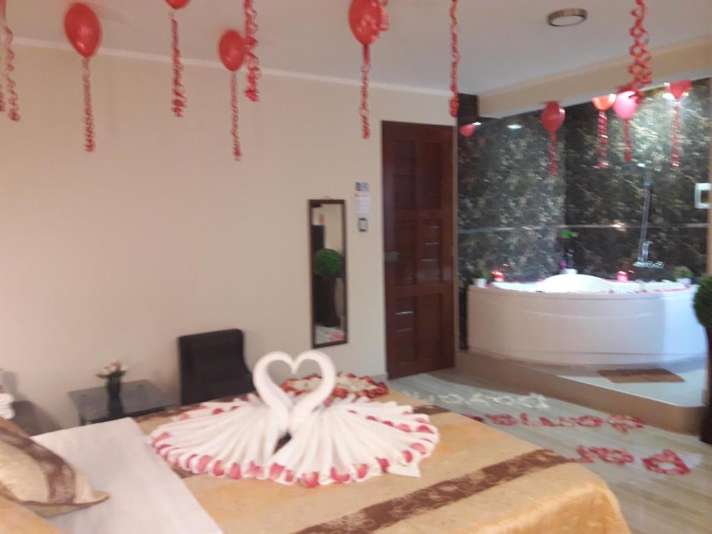 Postel nebo postele na pokoji v ubytování Gavina Inn Hotel