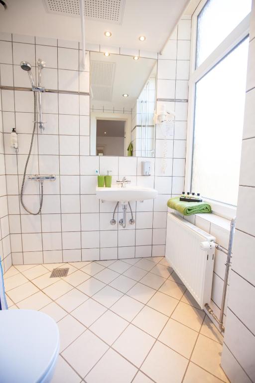 Koupelna v ubytování Go Hotel Ansgar