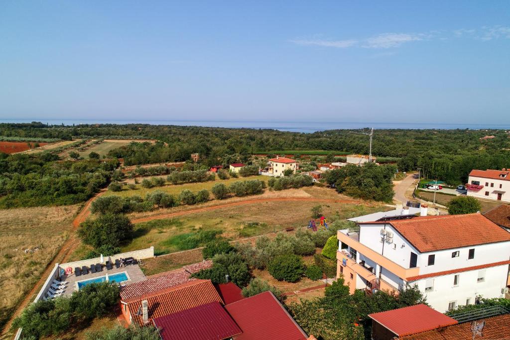 an aerial view of a small village with houses at Apartments Villa Adamović in Umag