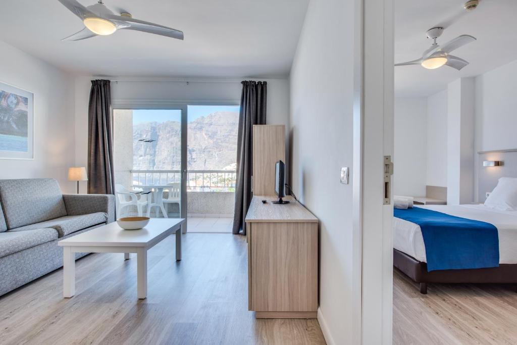 A bed or beds in a room at Vigilia Park