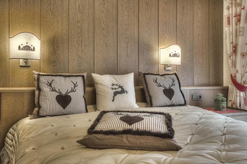 Postel nebo postele na pokoji v ubytování Hotel Luianta