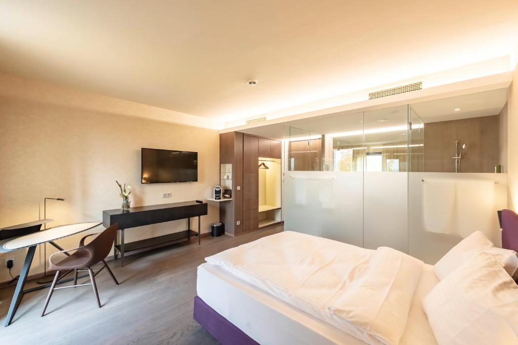 TV a/nebo společenská místnost v ubytování Hotel Gasthof Fischer