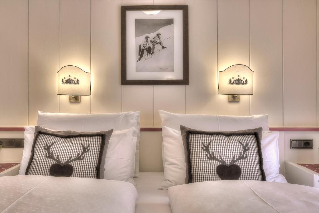 Postel nebo postele na pokoji v ubytování Hotel Luianta