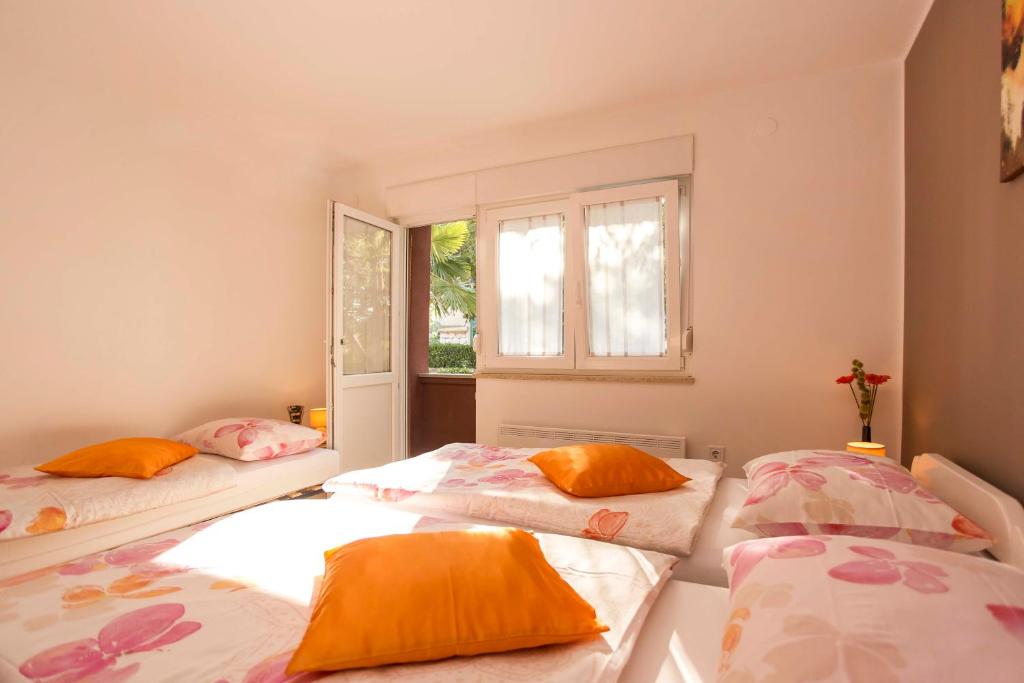 Postel nebo postele na pokoji v ubytování Apartman Barbara