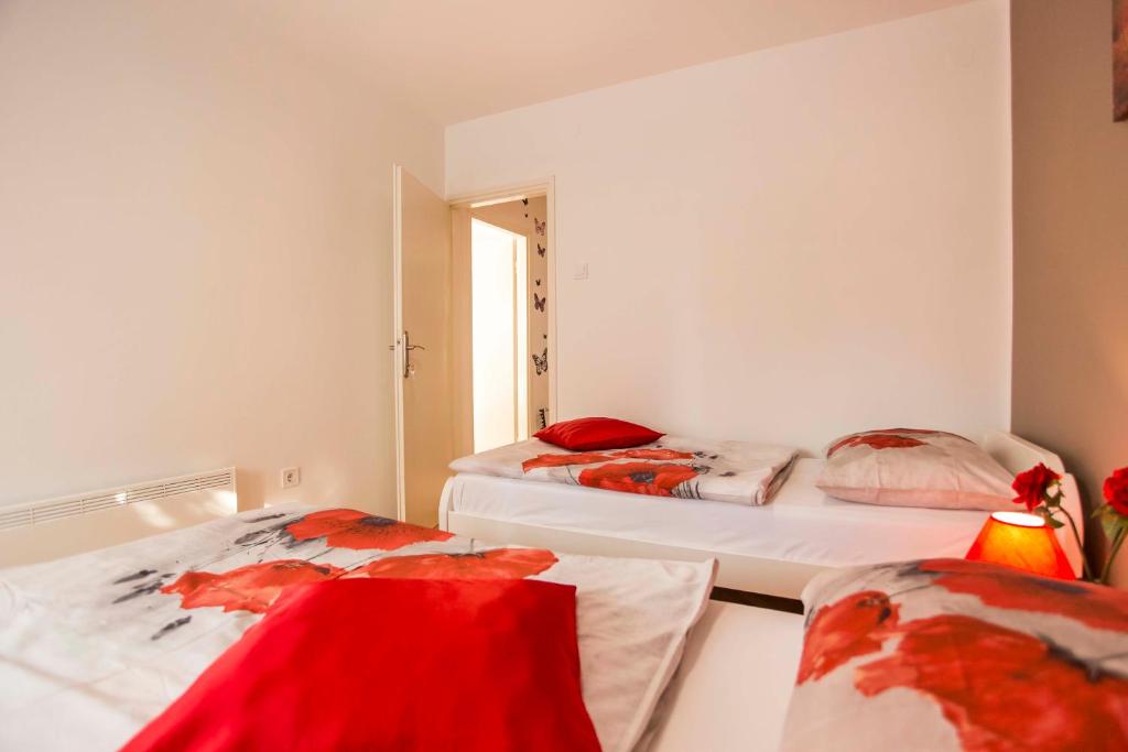 Postel nebo postele na pokoji v ubytování Apartman Barbara