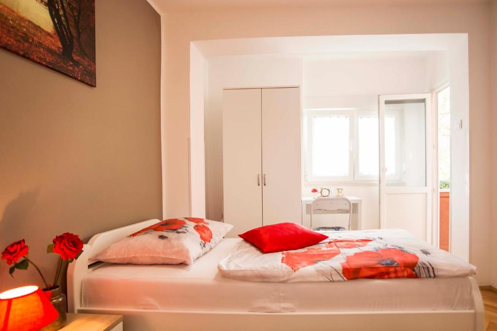 Postel nebo postele na pokoji v ubytování Apartman Barbara