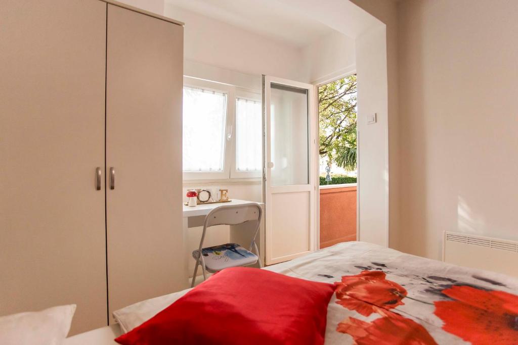 Postel nebo postele na pokoji v ubytování Apartman Barbara
