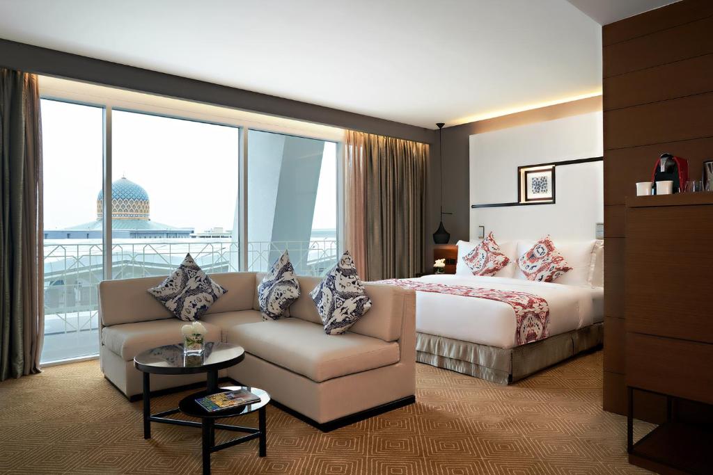Postel nebo postele na pokoji v ubytování Movenpick Hotel & Convention Centre KLIA