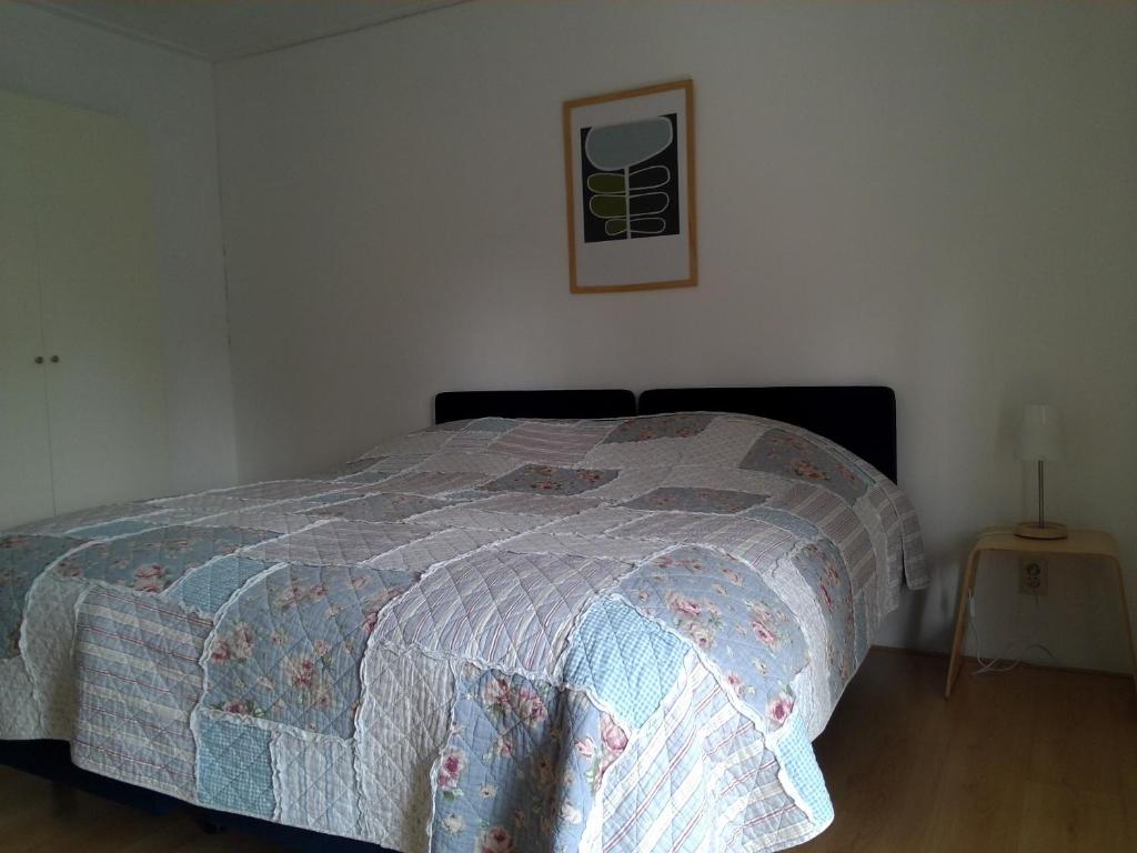 Postel nebo postele na pokoji v ubytování Bed & Breakfast Uiterburen