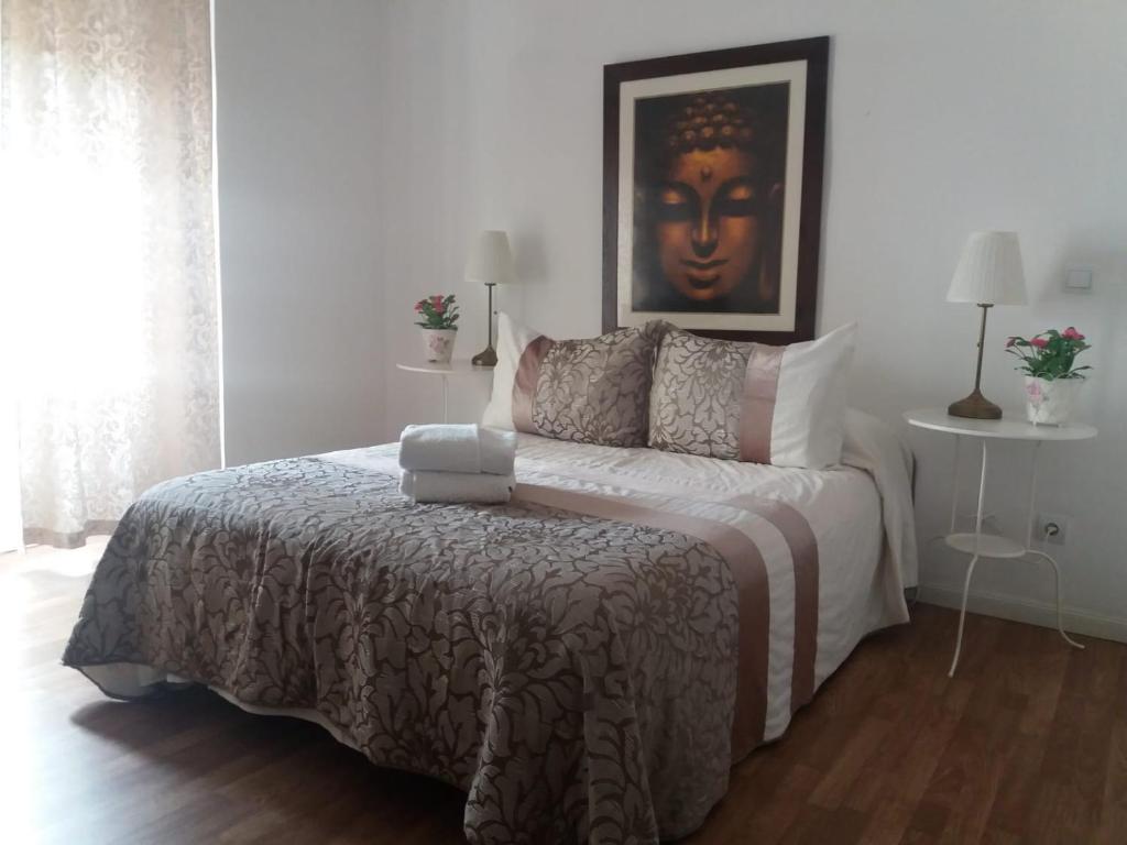 A bed or beds in a room at Casa de Huéspedes Prada