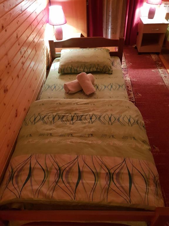 Postelja oz. postelje v sobi nastanitve Guest house Anka