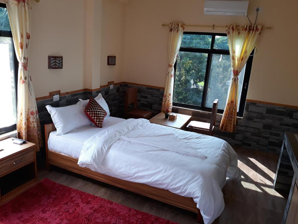 Postel nebo postele na pokoji v ubytování Peacock - a family-run hotel