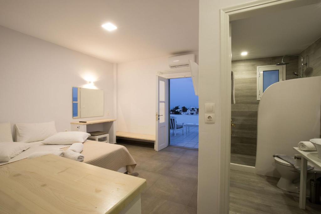 Postel nebo postele na pokoji v ubytování Hotel Galini Sifnos