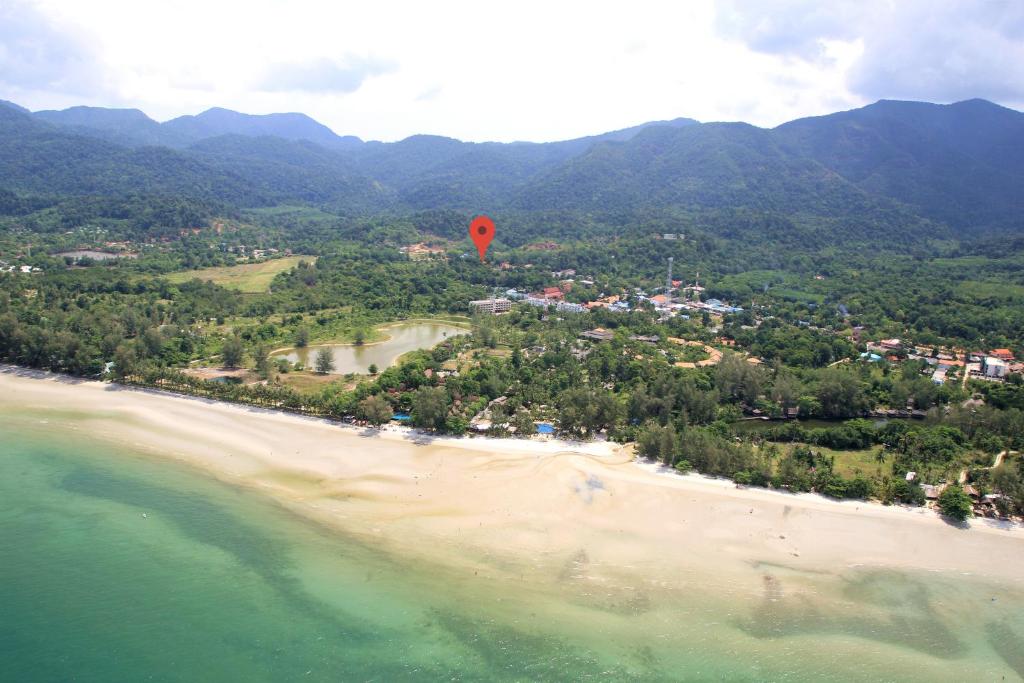 a hot air balloon flying over a beach at Tropical Paradise Leelawadee Resort in Ko Chang