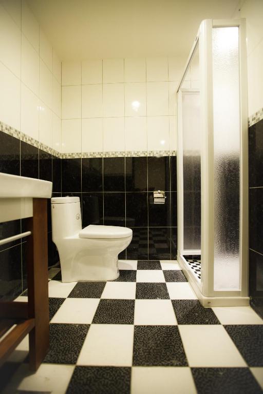 Koupelna v ubytování Kaishen Hotel