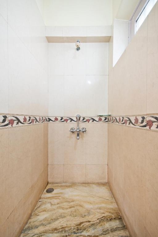 Postel nebo postele na pokoji v ubytování Prakash Kutir B&B