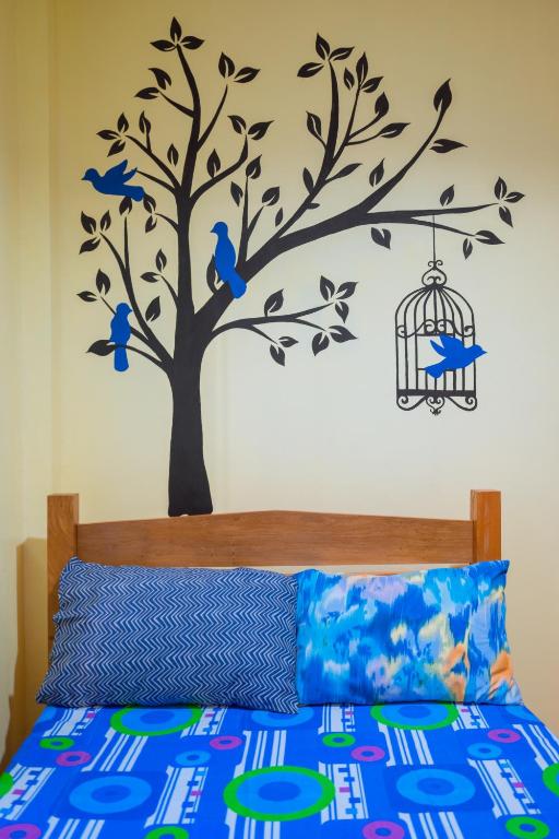 Postel nebo postele na pokoji v ubytování Joval Homestay