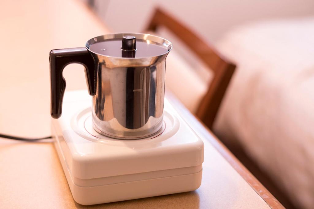 Příslušenství pro přípravu čaje a kávy v ubytování Hashimoto Park Hotel